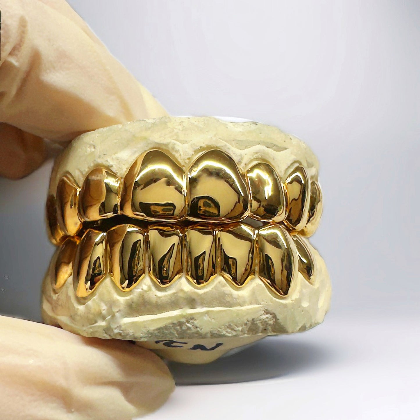 Solid Gold Grillz Made to Order, Custom Fitted Teeth Grillz - GRILLZSTATION 